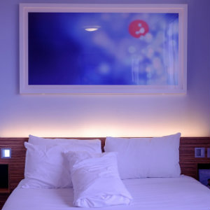 hotel bedroom with wall light
